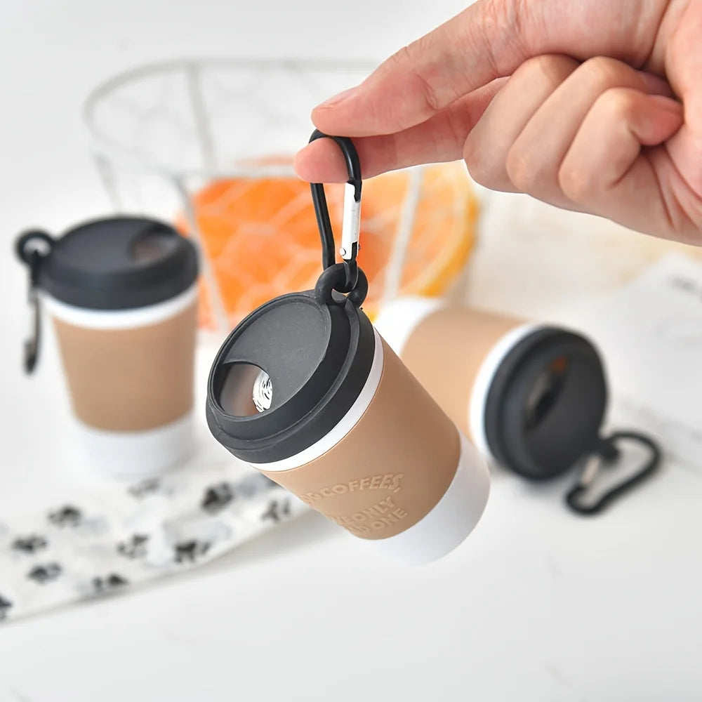 Dispensador portátil de bolsas para excrementos de perro: soporte tipo taza para pasear perros.